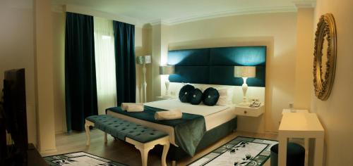 Postel nebo postele na pokoji v ubytování Lioncity Hotel