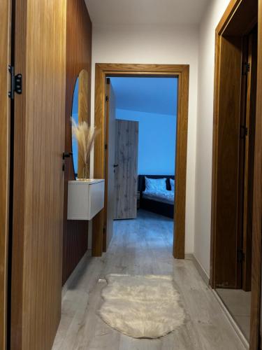 En eller flere senge i et værelse på Thermal Bliss Apartment