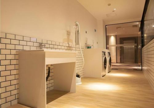 Koupelna v ubytování Borrman Hotel Dongguan Zhongtang