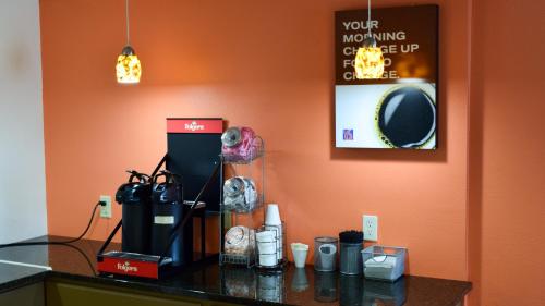 a counter top with items on it in a room at Motel 6-Springfield, OH in Springfield