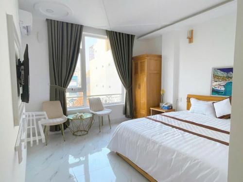 En eller flere senge i et værelse på The Diamond Hotel