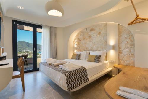 Ένα ή περισσότερα κρεβάτια σε δωμάτιο στο Green Sea Villas