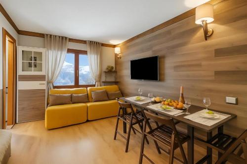 Μια τηλεόραση ή/και κέντρο ψυχαγωγίας στο Abeti Mountain View - Happy Rentals