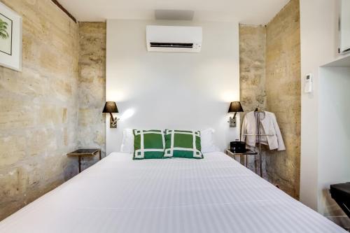 Katil atau katil-katil dalam bilik di Maison Ingwë - Place Gambetta