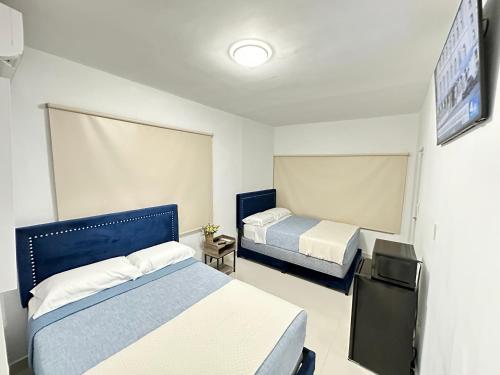 Postel nebo postele na pokoji v ubytování Kantares Guest 4 min Airport