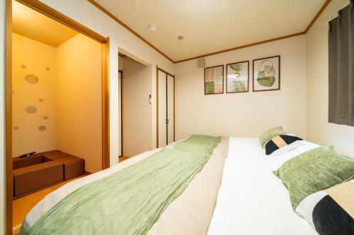 "Ayame Inn" 浅草まで直通10分, 観光地へアクセス抜群, 羽田空港直通, 京成立石駅徒歩5分, 最大10名様, 設備充実