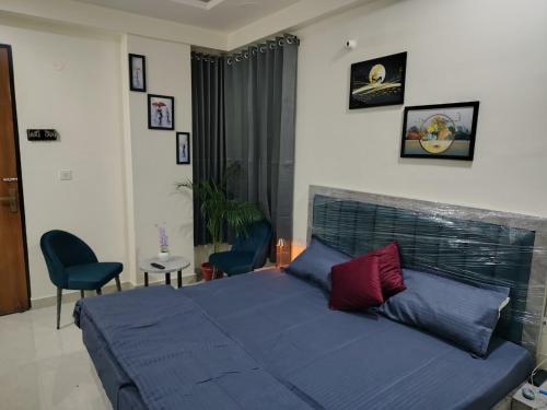 En eller flere senge i et værelse på The Velvet Rooms