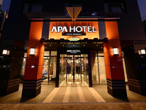 an entrance to an apa hotel at night at APA Hotel Oita Ekimae in Oita