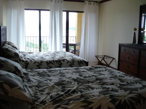 Katil atau katil-katil dalam bilik di Sunset Heights 402