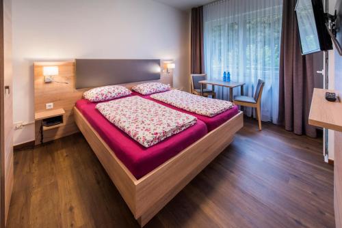 Ένα ή περισσότερα κρεβάτια σε δωμάτιο στο Hotel Baccara