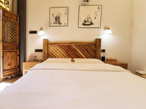 Ένα ή περισσότερα κρεβάτια σε δωμάτιο στο Nostalgia 28 lodge