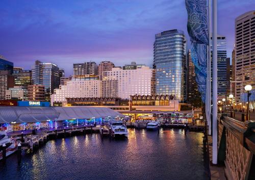 a view of a city with boats in the water at Hyatt Regency Sydney in Sydney