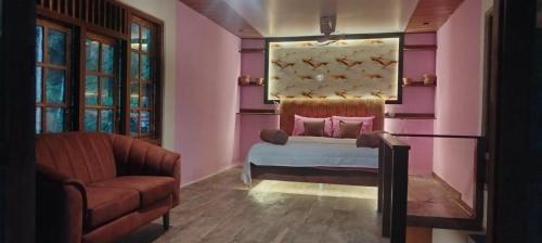 En eller flere senge i et værelse på Ella EDAN Homestay