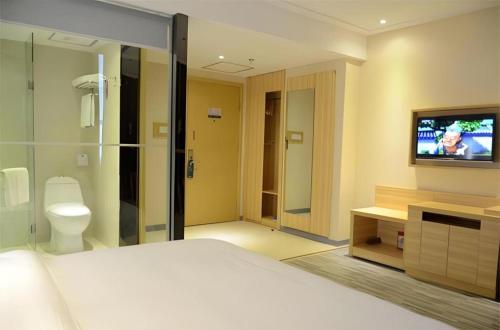 Ένα μπάνιο στο City Comfort Inn Wuhan Wansongyuan Wangjiadun East Metro