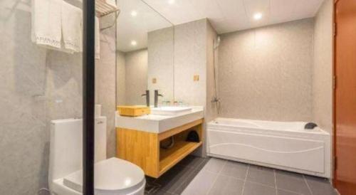 Ένα μπάνιο στο James Joyce Coffetel Qinhuangdao Taiyangcheng Wenhua Road