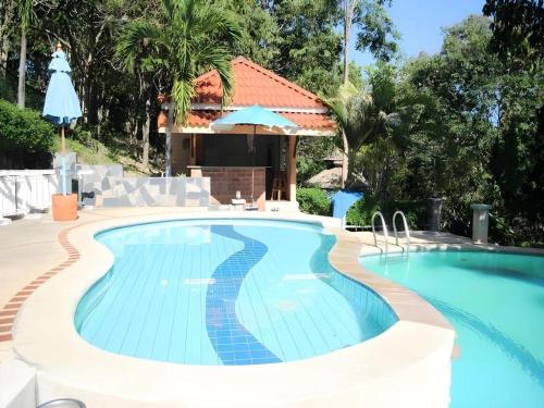 a swimming pool at a resort at Baan Suan Sook Resort in Chaweng