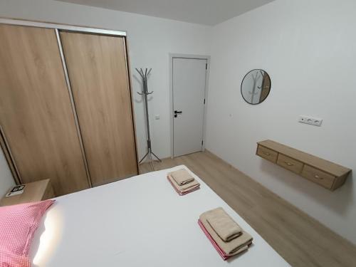 Ένα ή περισσότερα κρεβάτια σε δωμάτιο στο Апартамент 10 улица Македония 33