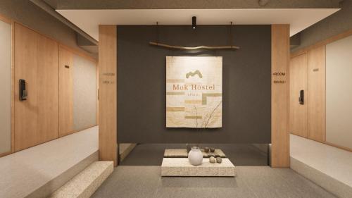 En eller flere senge i et værelse på Mok Hostel Seoul Myeongdong