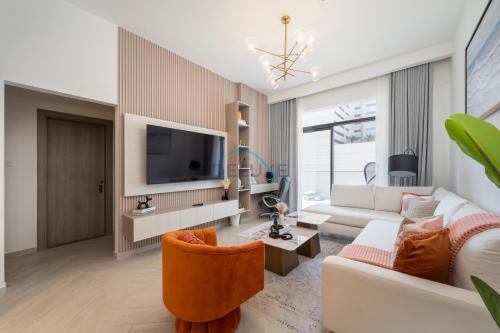 Few Minutes Walk to Circle Mall, Conveniently Close Community Park, and Near the Bus Station for Effortless Metro Access - Oxford Terraces, JVC by Deluxe Holiday Homes