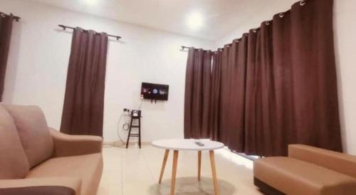 Khu vực ghế ngồi tại OYO 90507 Chalet Sumayyah