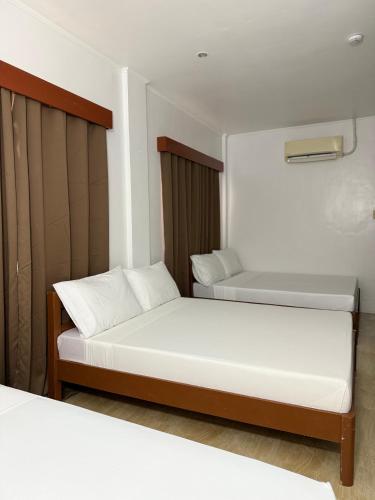 Krevet ili kreveti u jedinici u objektu Seashore Inn