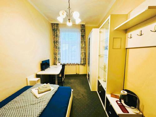 Postel nebo postele na pokoji v ubytování Aparthotel Mariazellerhof