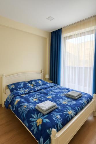 Ένα ή περισσότερα κρεβάτια σε δωμάτιο στο New Gudauri, Twins Apartment A Block