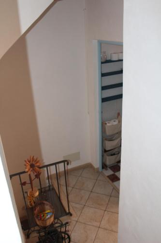 a room with a staircase and a room with a hallway at Soleluna in Castellammare del Golfo