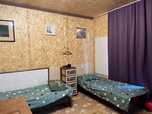 Una cama o camas en una habitación de Дом в Севан House in Sevan