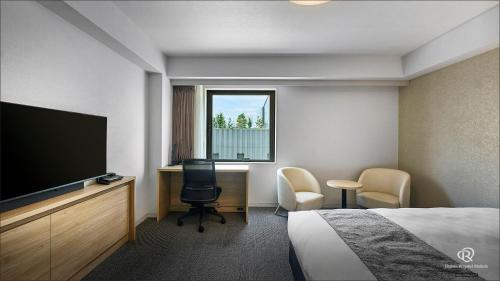 TV a/nebo společenská místnost v ubytování Daiwa Roynet Utsunomiya