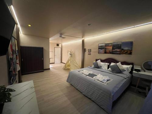 Ένα ή περισσότερα κρεβάτια σε δωμάτιο στο Moochi Relax L'Assommior