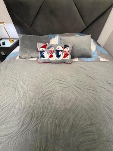 Postel nebo postele na pokoji v ubytování Cozy apartment in the center