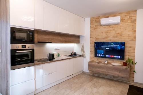 Η κουζίνα ή μικρή κουζίνα στο DowntownKate