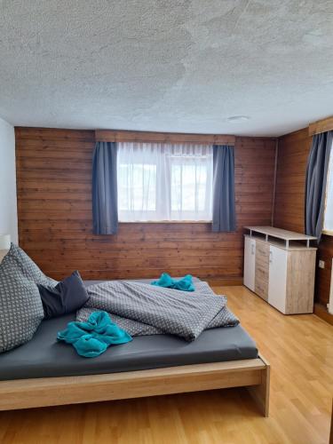 Ένα ή περισσότερα κρεβάτια σε δωμάτιο στο Ferienhof Bichlhof