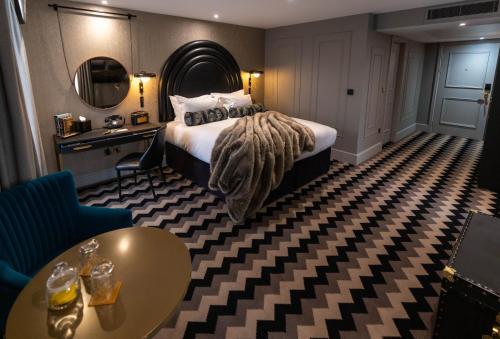 Postel nebo postele na pokoji v ubytování Hotel Gotham Newcastle