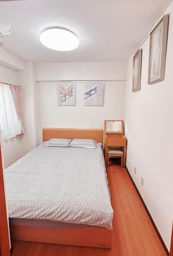 Una cama o camas en una habitación de HYGGE HOUSE Tabibitonoie - Vacation STAY 33509v