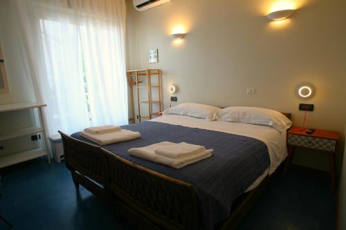 Giường trong phòng chung tại Poggio del sole