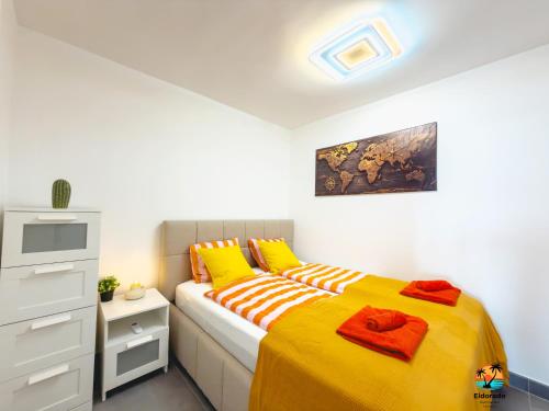 Ένα ή περισσότερα κρεβάτια σε δωμάτιο στο El Dorado