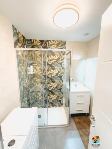 a bathroom with a shower and a sink at El Dorado in Arguineguín