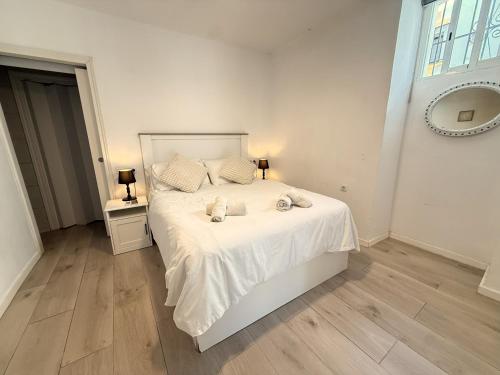 Casa Sirena tesisinde bir odada yatak veya yataklar