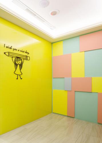 a room with a colorful wall with a drawing on it at V-one Hotel - Ningxia No. 2 Inn in Taipei