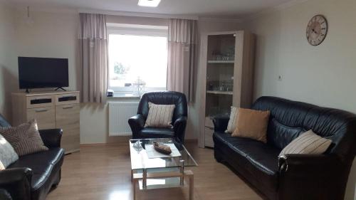 Μια τηλεόραση ή/και κέντρο ψυχαγωγίας στο Ferienhaus-Feinen