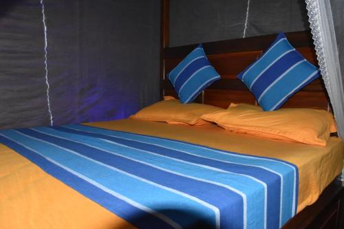 Кровать или кровати в номере Diamond Villa Weligama Bay