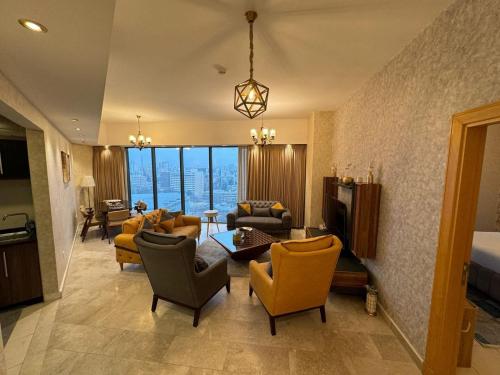 Un lugar para sentarse en Damac Tower Amman - Luxury Studio - استوديوهات فاخرة - داماك عمان العبدلي