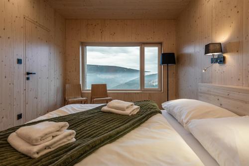 Postel nebo postele na pokoji v ubytování Chata Na Vyhlídce