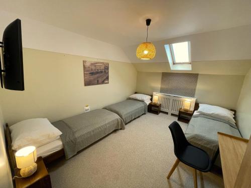 Ένα ή περισσότερα κρεβάτια σε δωμάτιο στο Teka Guesthouse