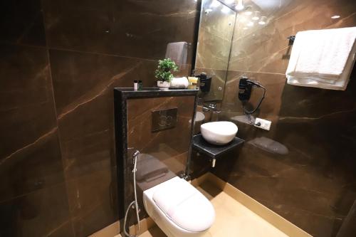 Koupelna v ubytování Hotel Relax Inn Ganga Rishikesh