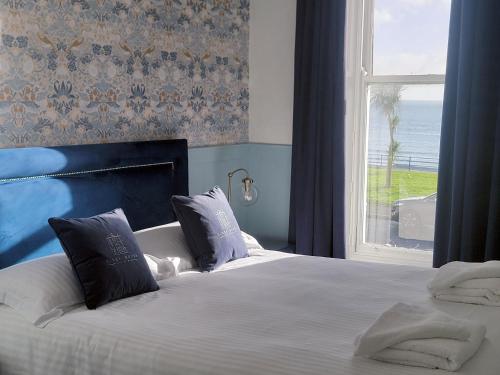 Ένα ή περισσότερα κρεβάτια σε δωμάτιο στο Kings' House