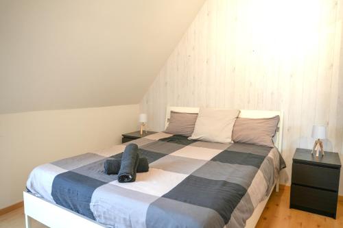 Postel nebo postele na pokoji v ubytování Appartement chaleureux - 20 min de Strasbourg