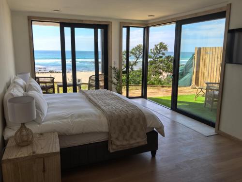 Postel nebo postele na pokoji v ubytování Secret Sunrise